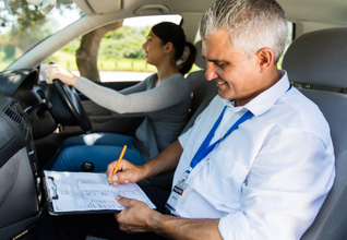 Learner driver taking driving lessons